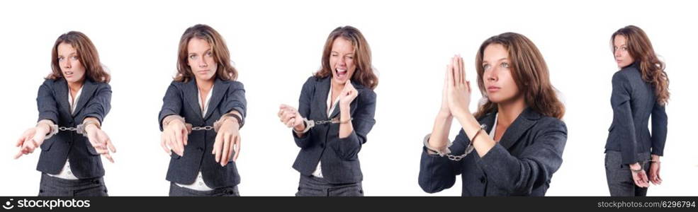 Female businesswoman with handcuffs on white