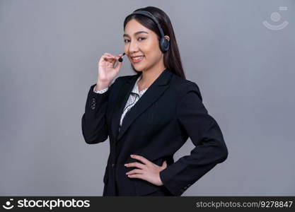 Female call center operator wearing headset and formal suit standing confidently with gesture for product advertisement or HR recruitment on isolated background. Jubilant. Female call center operator wearing headset making advertising gesture. Jubilant