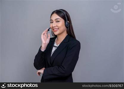 Female call center operator wearing headset and formal suit standing confidently with gesture for product advertisement or HR recruitment on isolated background. Jubilant. Female call center operator wearing headset making advertising gesture. Jubilant