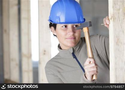 female carpenter at construction site