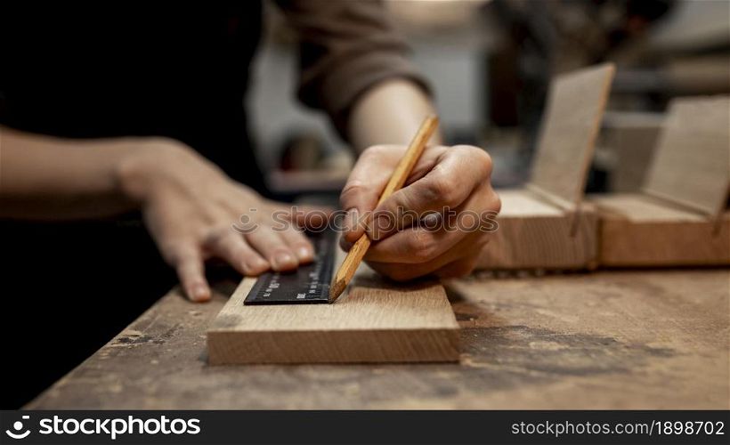 female carpenter working studio with pencil. Resolution and high quality beautiful photo. female carpenter working studio with pencil. High quality beautiful photo concept
