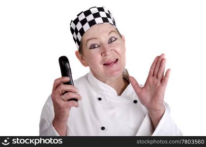 female chef in work clothes holding a mobile phone