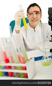 Female chemist in studio on white