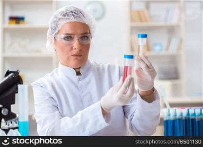 Female chemist working in lab