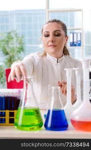 Female chemist working in medical lab 