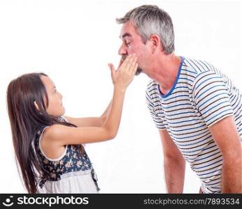 Female child slapping father across face, dad shocked