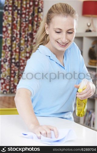 Female Cleaner Working In House