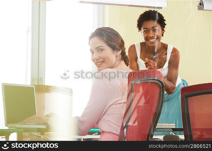 Female colleagues in conference room portrait