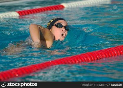 Female Competitive Swimmer Doing Laps