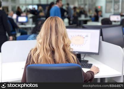 Female computer operator at work