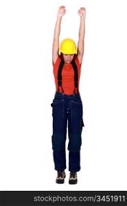 Female construction worker hanging in empty copyspace