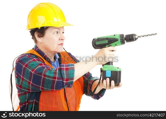 Female construction worker holding a power drill. Isolated on white.
