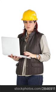 Female construction worker using her laptop