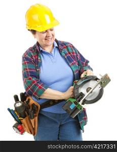 Female construction worker with a circular power saw. Isolated on white.