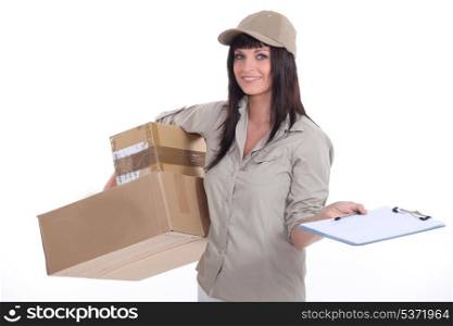Female courier with parcels and a clipboard