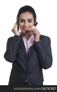 Female customer service representative wearing headset isolated over white background