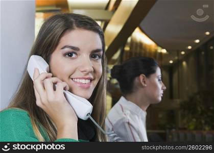 Female customer service representatives working in an office