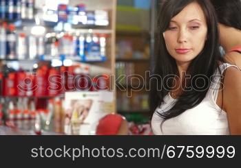 Female Customers Buying Beauty Care Products in Cosmetics Store