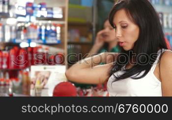 Female Customers Buying Beauty Care Products in Cosmetics Store