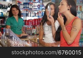 Female Customers Buying Beauty Care Products in Cosmetics Store, Testing Makeup Foundation