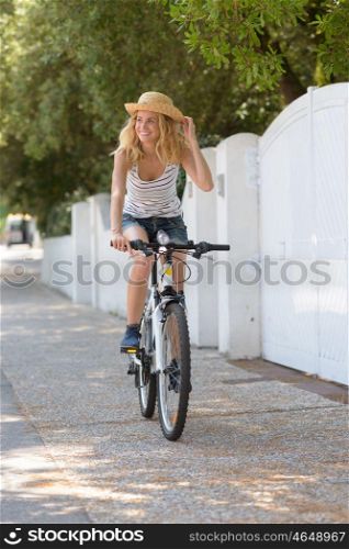 female cyclist going fast on bicycle