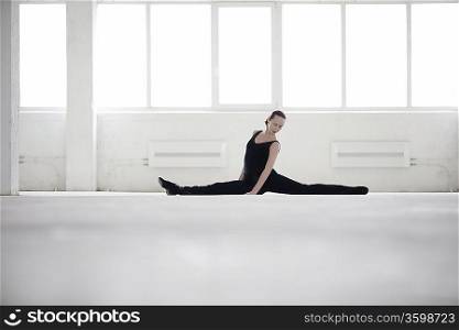 Female dancer doing the splits