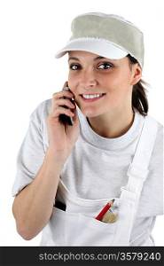 Female decorator on the telephone