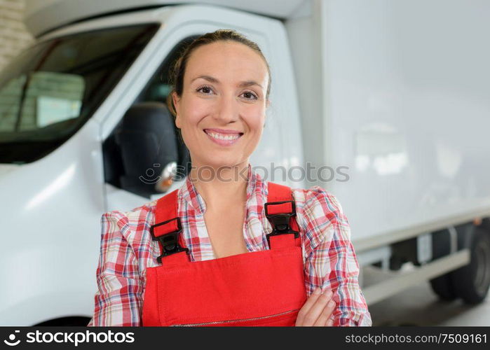 female delivery van technician posing