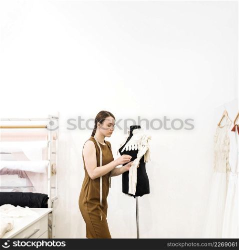 female designer working cloth shop