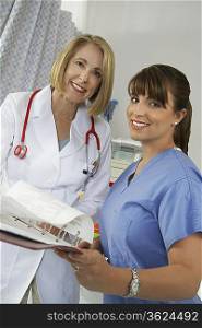 Female doctor and nurse in hospital, portrait