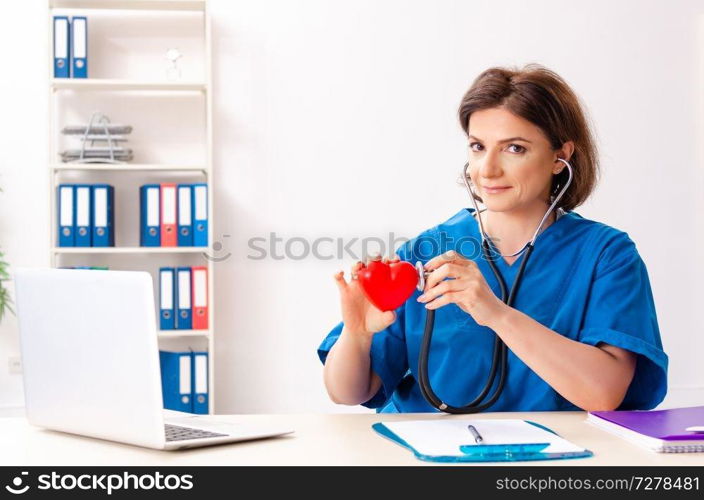 Female doctor cardiologist working in the hospital 