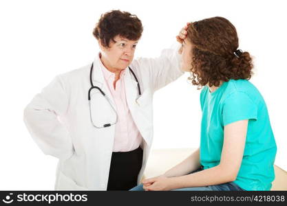 Female doctor feels the forehead of her teenage patient. Isolated on white.