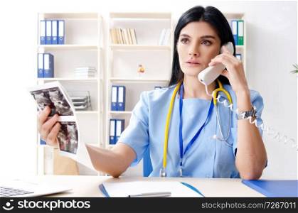 Female doctor gynecologist working in the clinic . Female doctor gynecologist working in the clinic