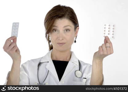 Female doctor handing over medicine isolated on white