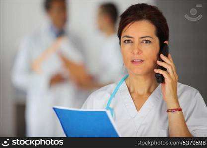 Female doctor on the phone