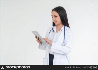 Female Doctor or physician holding a tablet for checking patient health in hospital, Concept of online healthcare information and emergency healthcare assistance service, Medical service