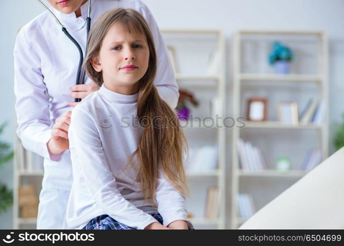 Female doctor pediatrician checking girl