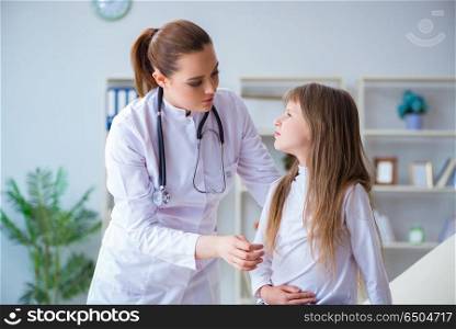 Female doctor pediatrician checking girl