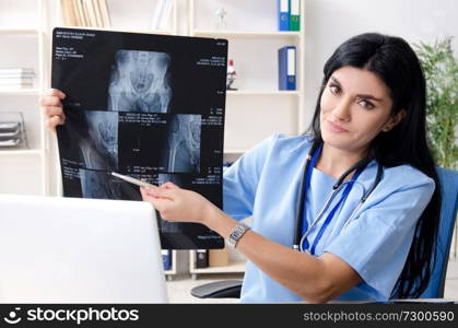 Female doctor radiologist working in the clinic 