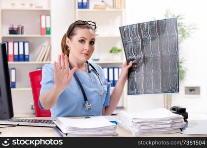 Female doctor radiologist working in the clinic 