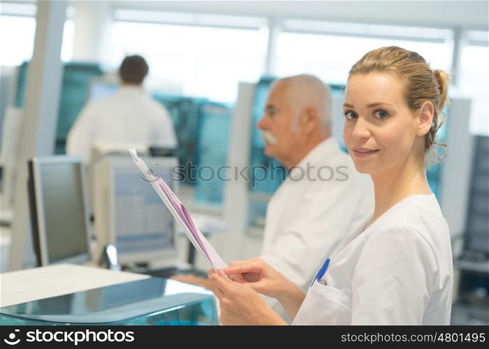 female doctor reading some patient results