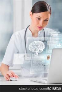 Female doctor scanning brain of patient with help of modern technology