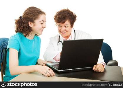 Female doctor showing a teenage patient her test results on the computer. Isolated on white.