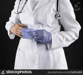 female doctor taking off her gloves 2
