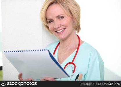 Female doctor with notebook