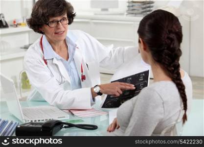 Female doctor with patient