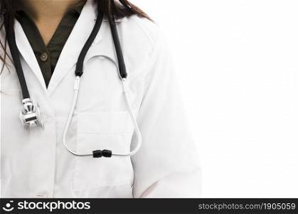 female doctor with stethoscope around her neck against white backdrop. Beautiful photo. female doctor with stethoscope around her neck against white backdrop