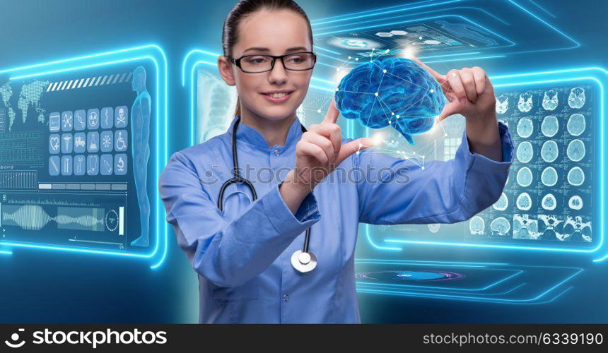 Female doctor with the brain in medical concept