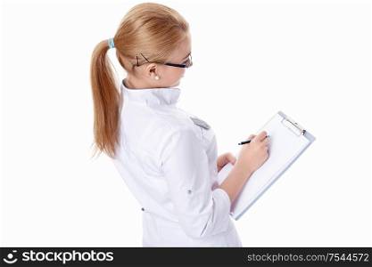 Female doctor writes on a white background