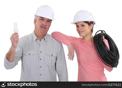 female electrician and mature mentor